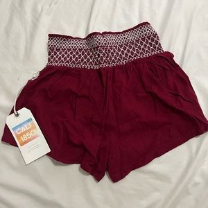 maroon flowy beach shorts